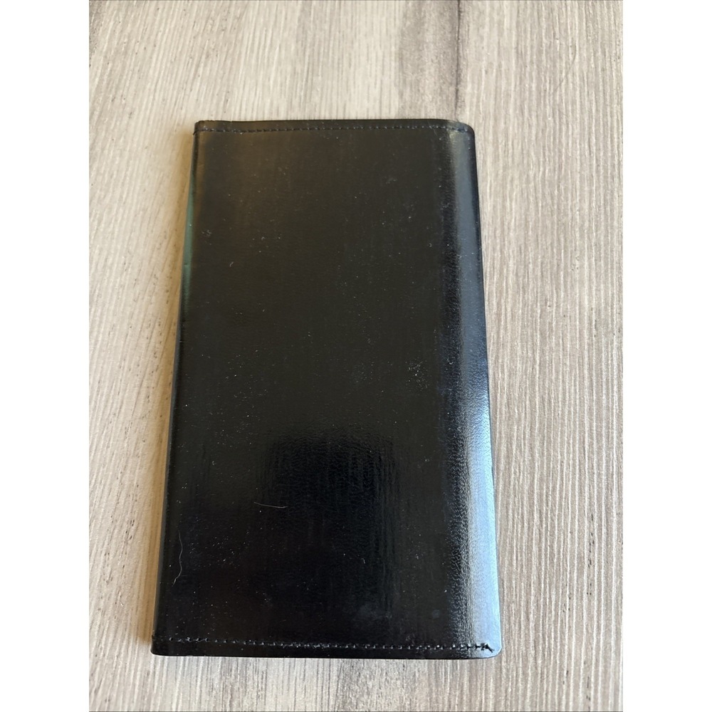 At A Glance Black Leather Wallet. Smooth with excellent quality